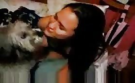 Sexy teen kissing her pet