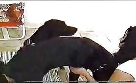 Brunette enjoys two dogs